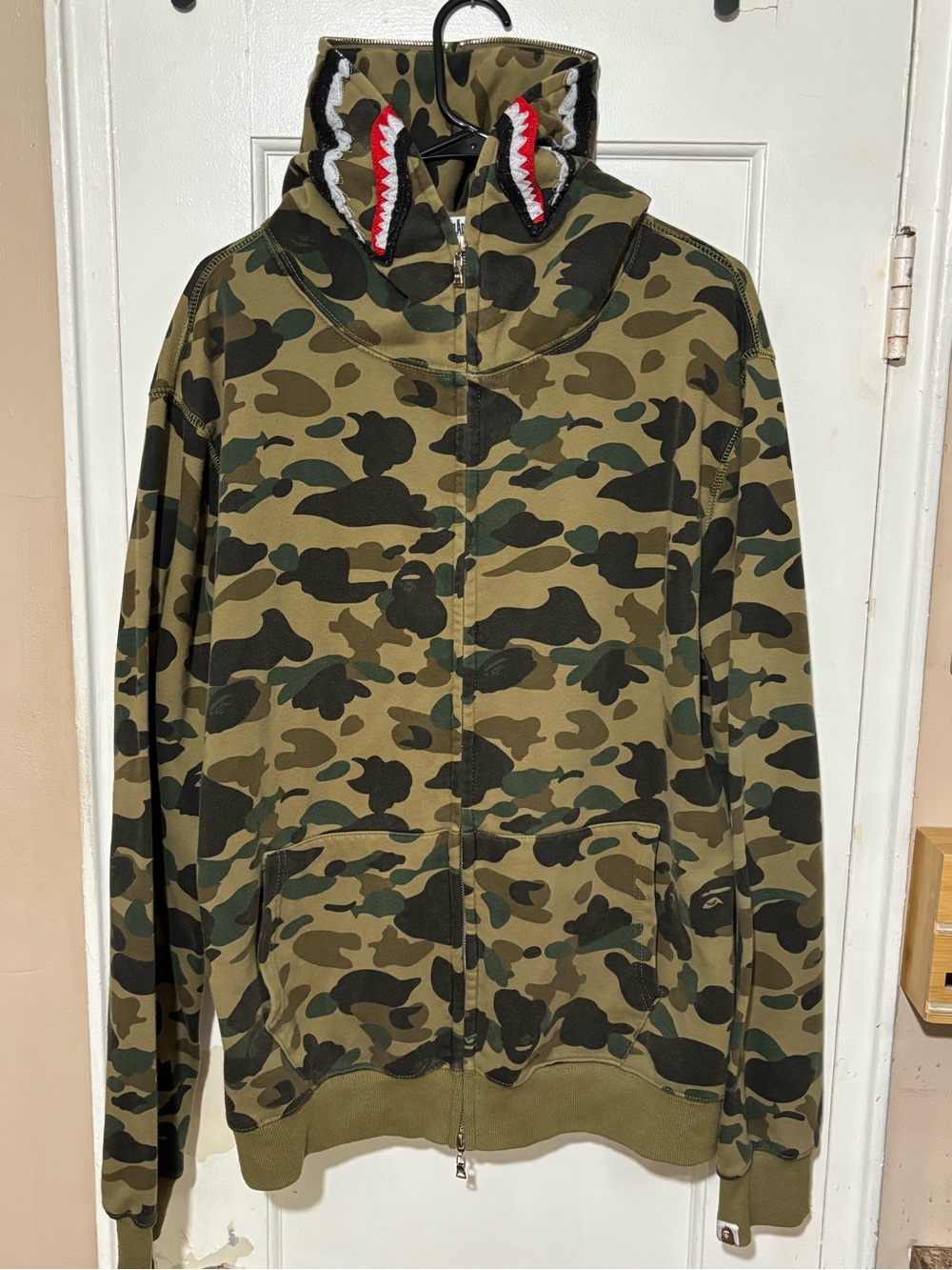 A BATHING APE WORLD GONE MAD HOODIE MENS.